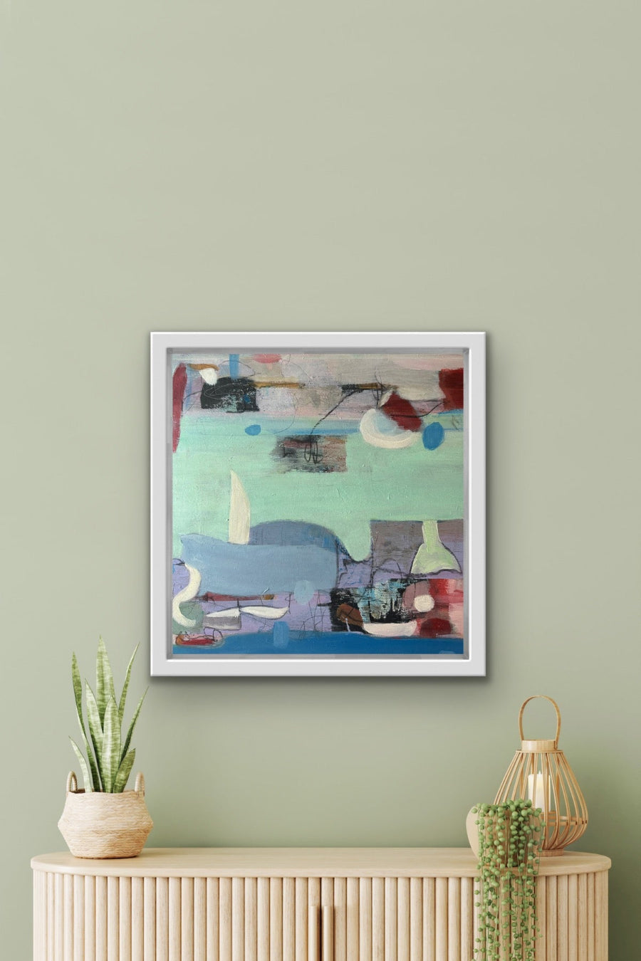 Abstract turquoise painting on the wall evoking a sailing feeling by Beata Bosze.